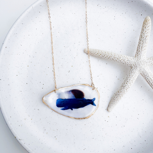 Hand-painted whale motif oyster shell necklace with gold-filled chain by Northern Tides Studio