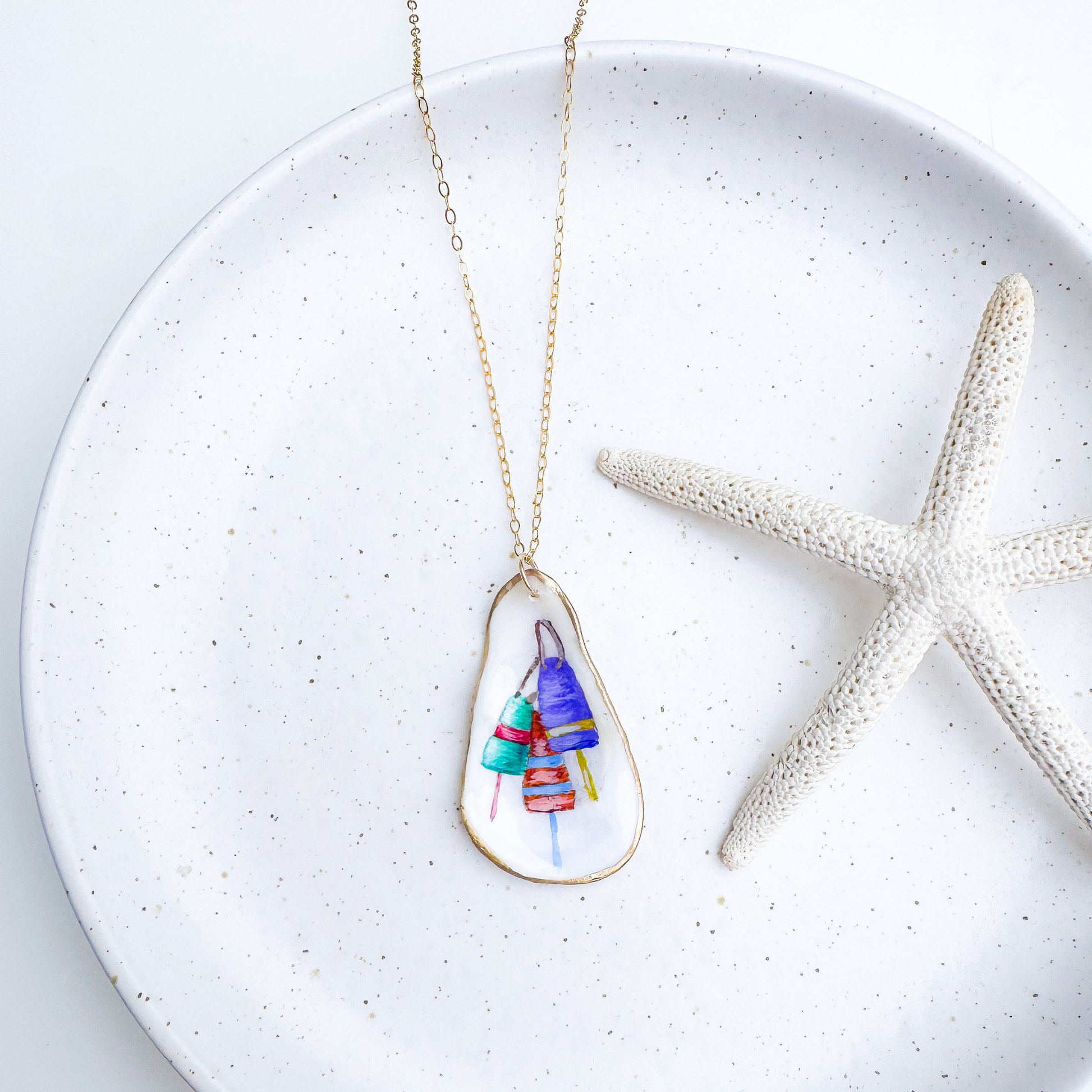 Hand-painted buoy motif oyster shell necklace with gold-filled chain by Northern Tides Studio