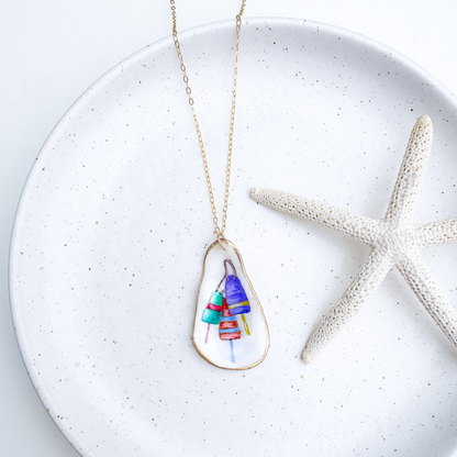 Hand-painted buoy motif oyster shell necklace with gold-filled chain by Northern Tides Studio